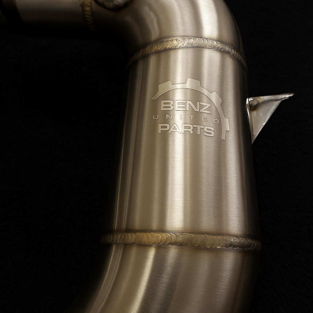 Close-up of BenzUnited Parts logo etched on stainless steel catless downpipe for 2018–2023 Mercedes-AMG E63 / E63S W213