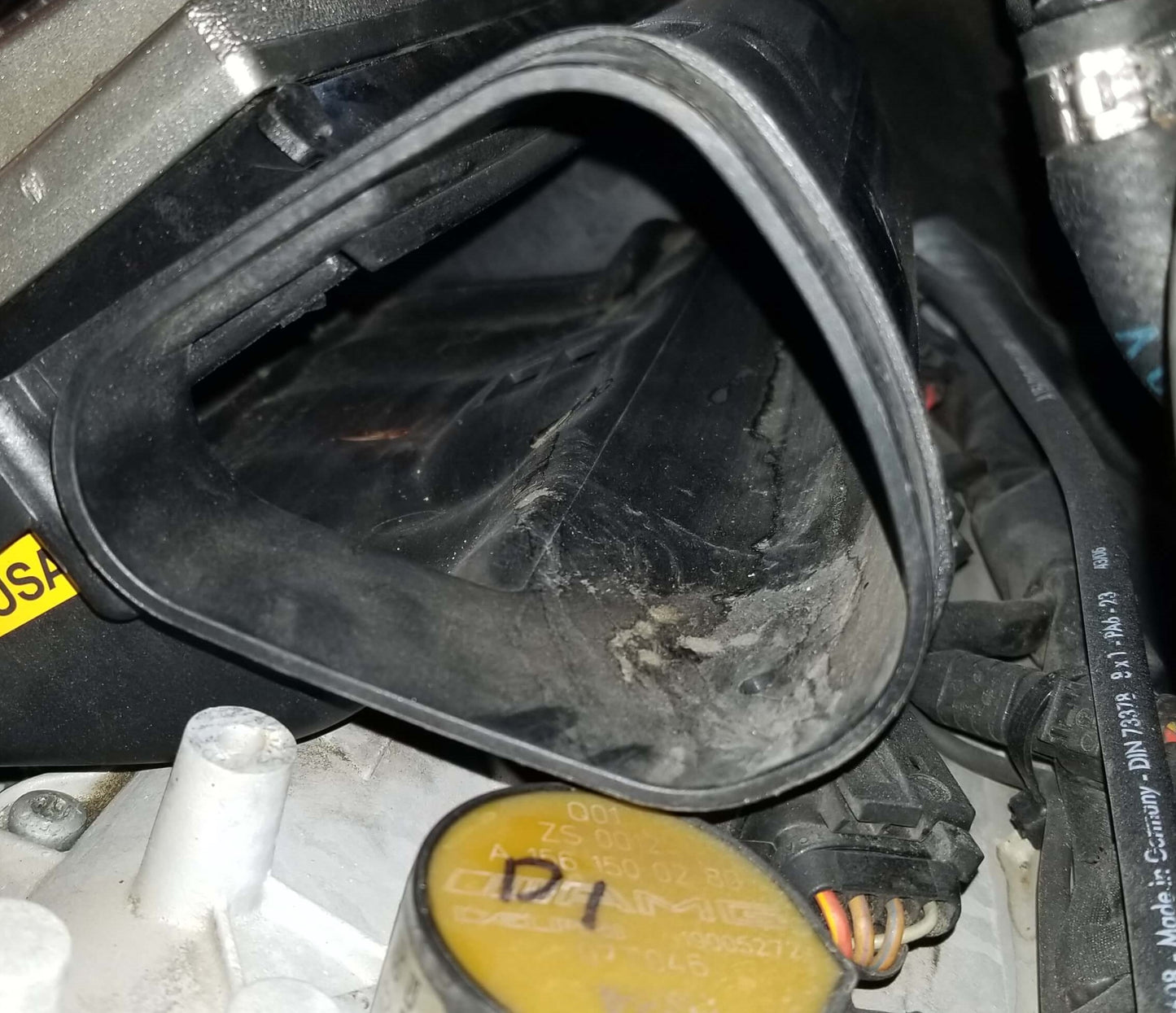 Close-up of M156 Intake Spacer in C63 AMG 6.2L V8 engine