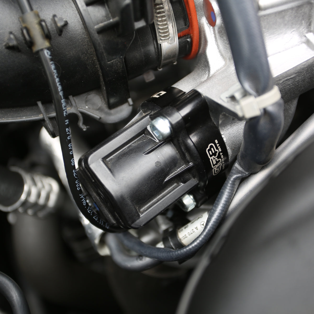 GFB DV+ T9358 diverter valve installed on a Mercedes M274 turbocharger in C300, E300, or GLC300