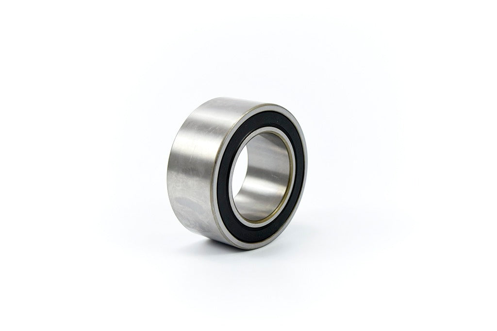 Angled view of OEM supercharger pulley bearing for Mercedes E55 AMG
