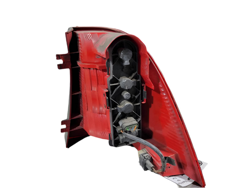 Back side of OEM driver side taillight for Mercedes W163 showing connector ports