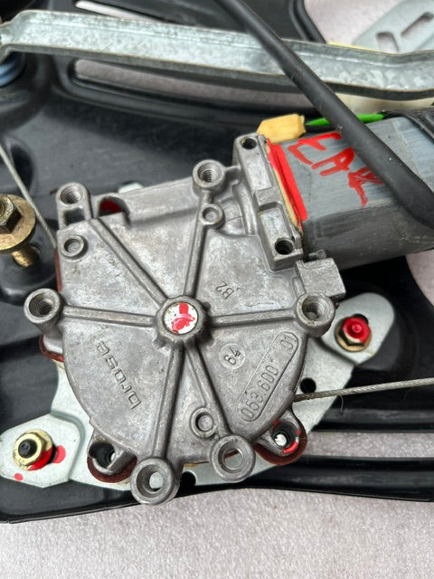 Detailed view of CLK W208 window motor showing Bosch part number