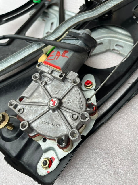 OEM Mercedes window motor close-up for CLK W208, label visible