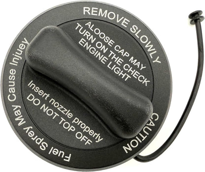 Top of gas cap 2224700205 for a 2017-2023 Mercedes E300 or E350, with moulded REMOVE SLOWLY and check engine warning