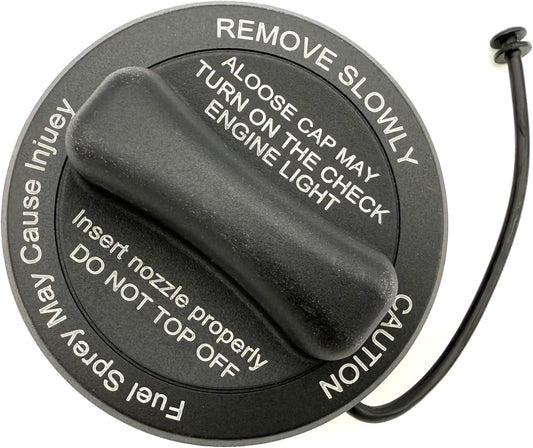Top of gas cap 2224700205 for a 2017-2023 Mercedes E300 or E350, with moulded REMOVE SLOWLY and check engine warning