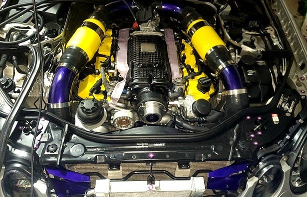 3″ aluminum M113k intake kit installed with yellow and blue silicone couplers – Mercedes-AMG M113k engines