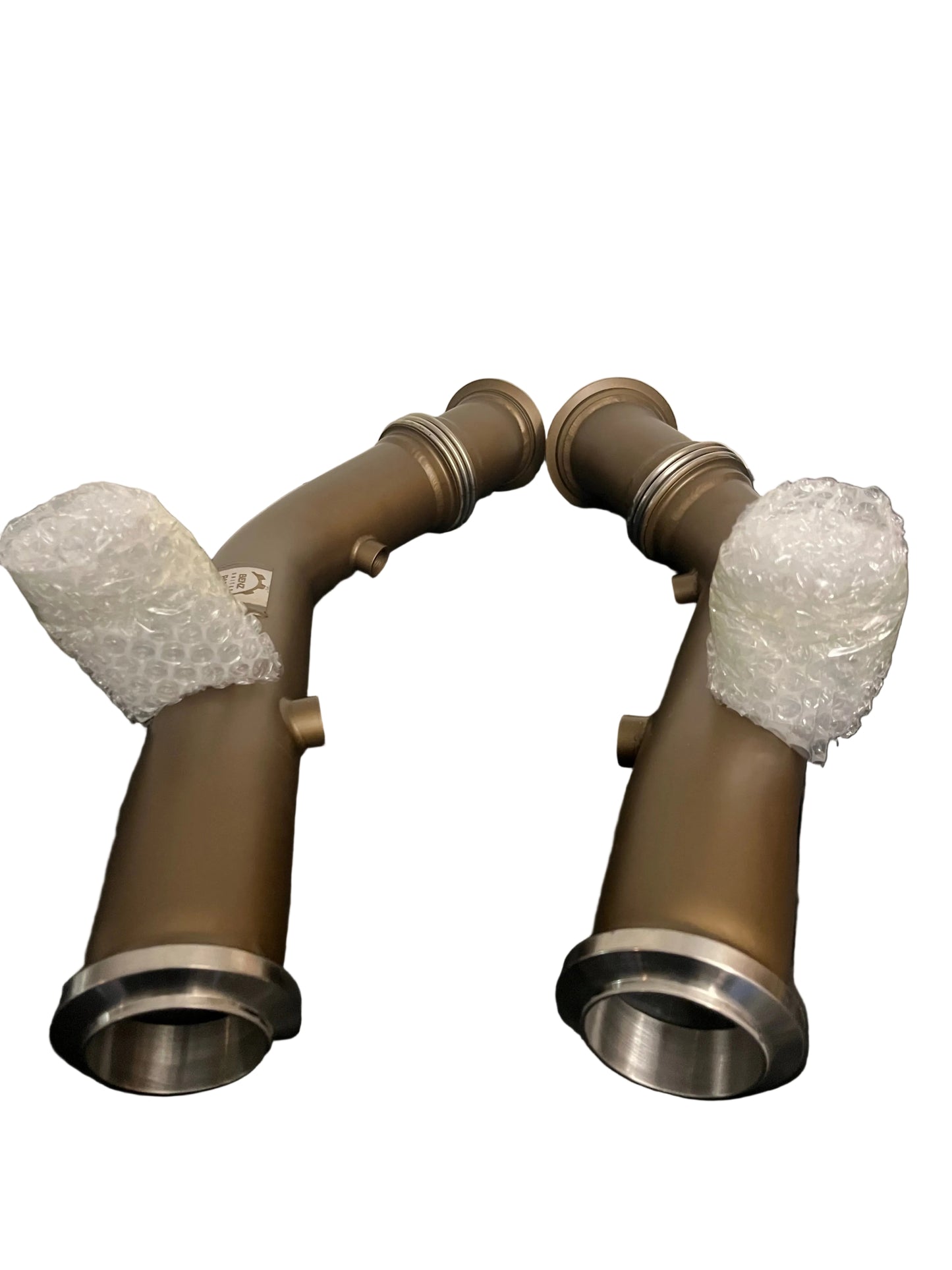 Detailed view of premium flex section and bend on ceramic coated downpipe for Mercedes C43 AMG