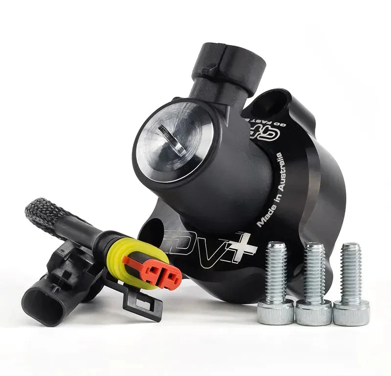 GFB DV+ diverter valve pictured with the supplied mounting bolts and installation hardware