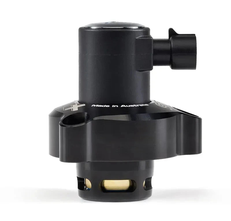 GFB DV+ diverter valve stood upright, outlet port and top cap in view