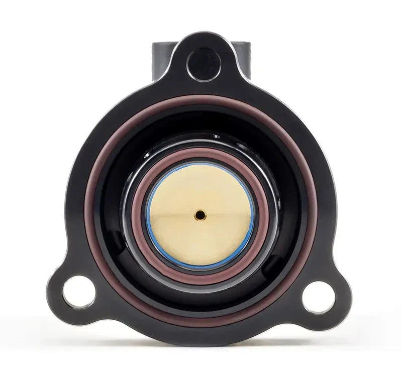 Flange face of the GFB DV+ diverter valve with the piston and sealing seat visible through the bore