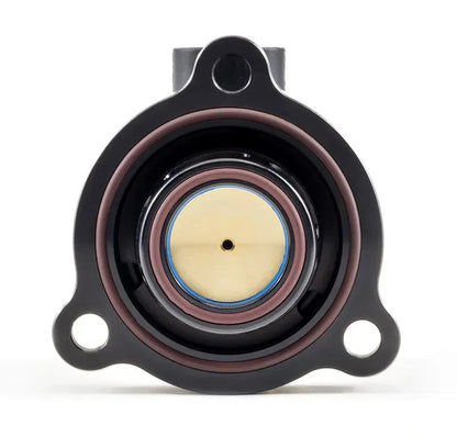 Flange face of the GFB DV+ diverter valve with the piston and sealing seat visible through the bore
