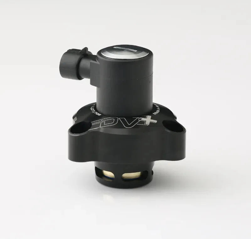 Side profile of the GFB DV+ diverter valve showing the outlet port and mounting flange
