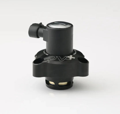 Side profile of the GFB DV+ diverter valve showing the outlet port and mounting flange