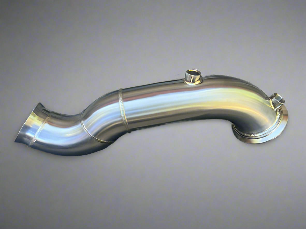 Metallic exhaust pipe on a concrete surface