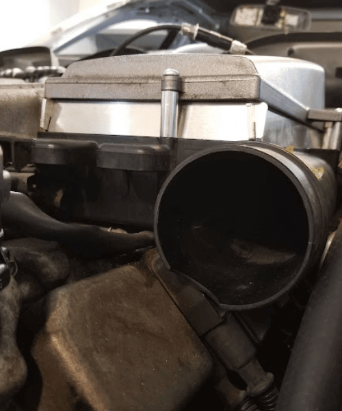 M113K AMG intake filter spacer kit installed showing improved filter clearance on supercharged Mercedes engine
