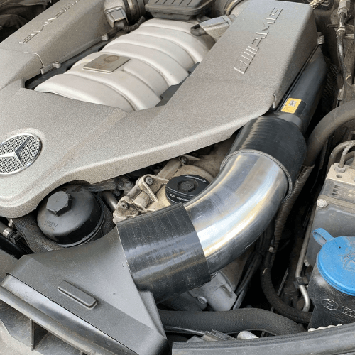 Single aluminum intake tube for Mercedes AMG M156 platform, highlighting polished finish and smooth internal airflow design