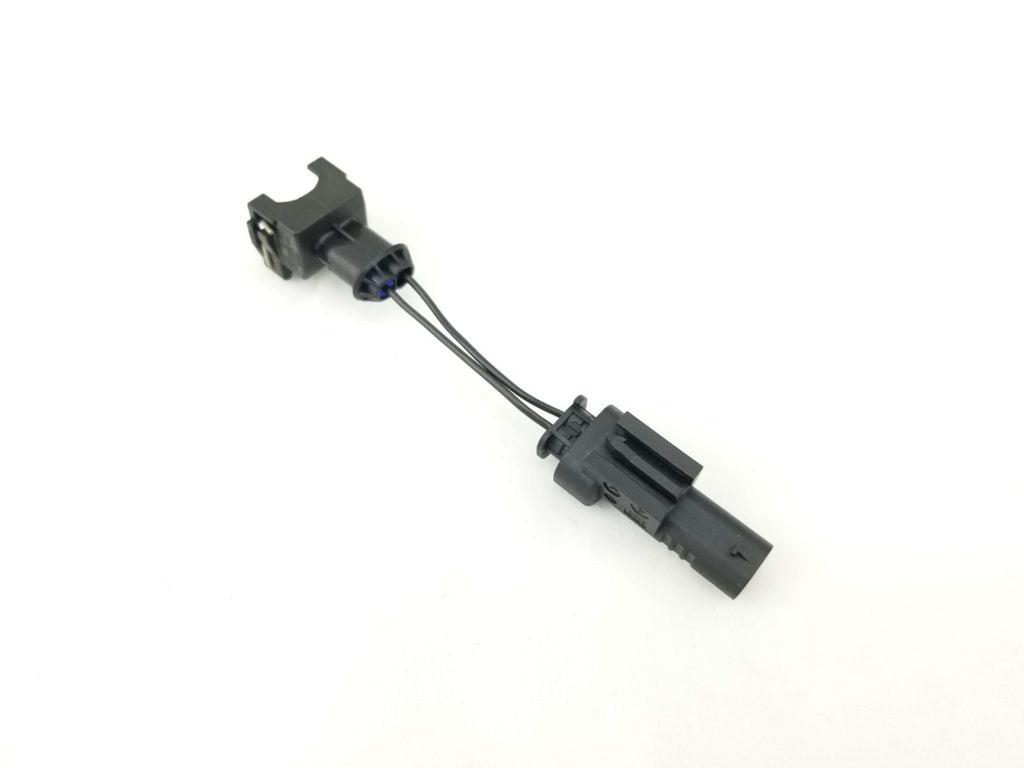 Close-up view of single M156 EV1 injector adapter harness showing high-quality plug and wiring connector detail