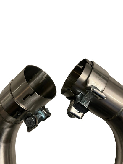 Close-up of M157 catless downpipe turbo-side flanges with hardware