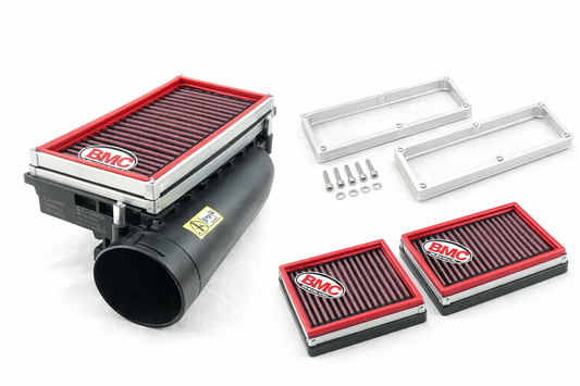 M157 AMG OEM airbox with intake spacer kit and high-flow drop-in filters installed on 5.5L BiTurbo V8