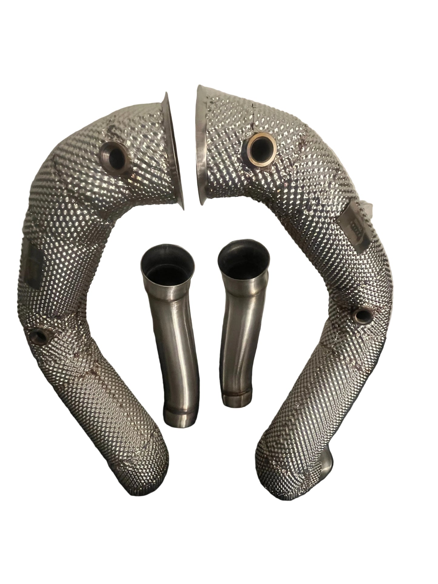 Angled view of premium heat shielded catless downpipes for C63 & C63S AMG W205