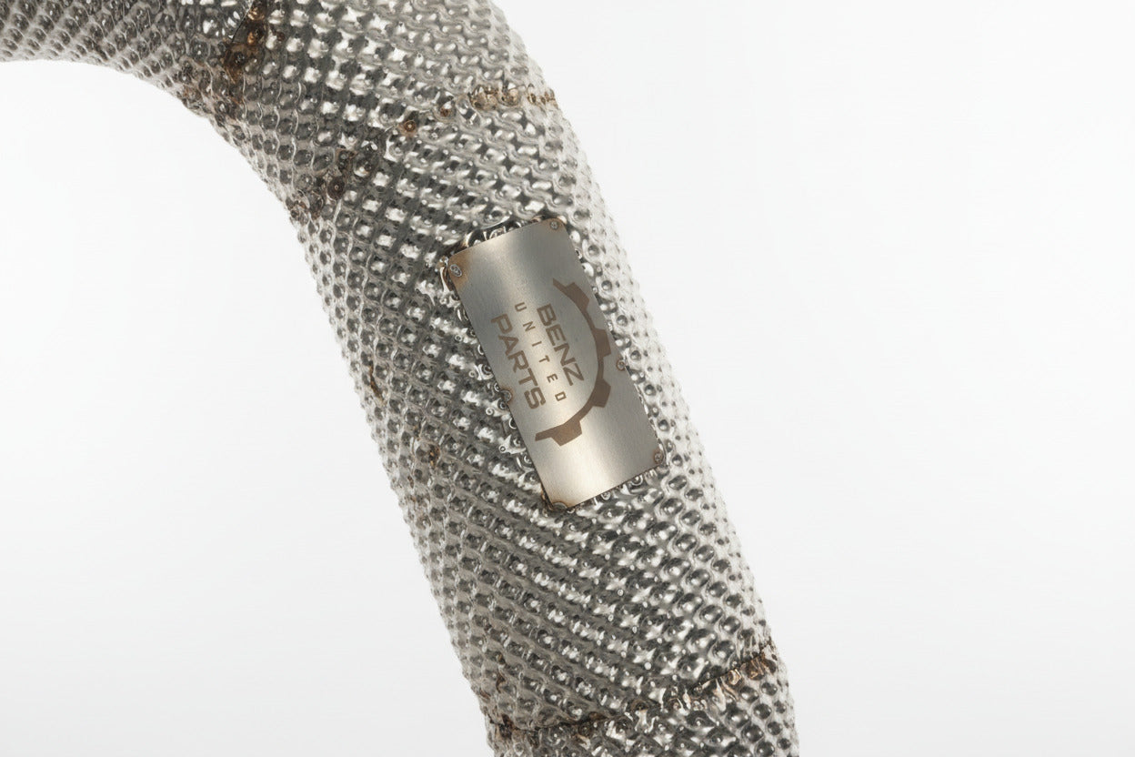 Close-up of outlet tips on heat shielded catless downpipes for Mercedes C63 AMG M177