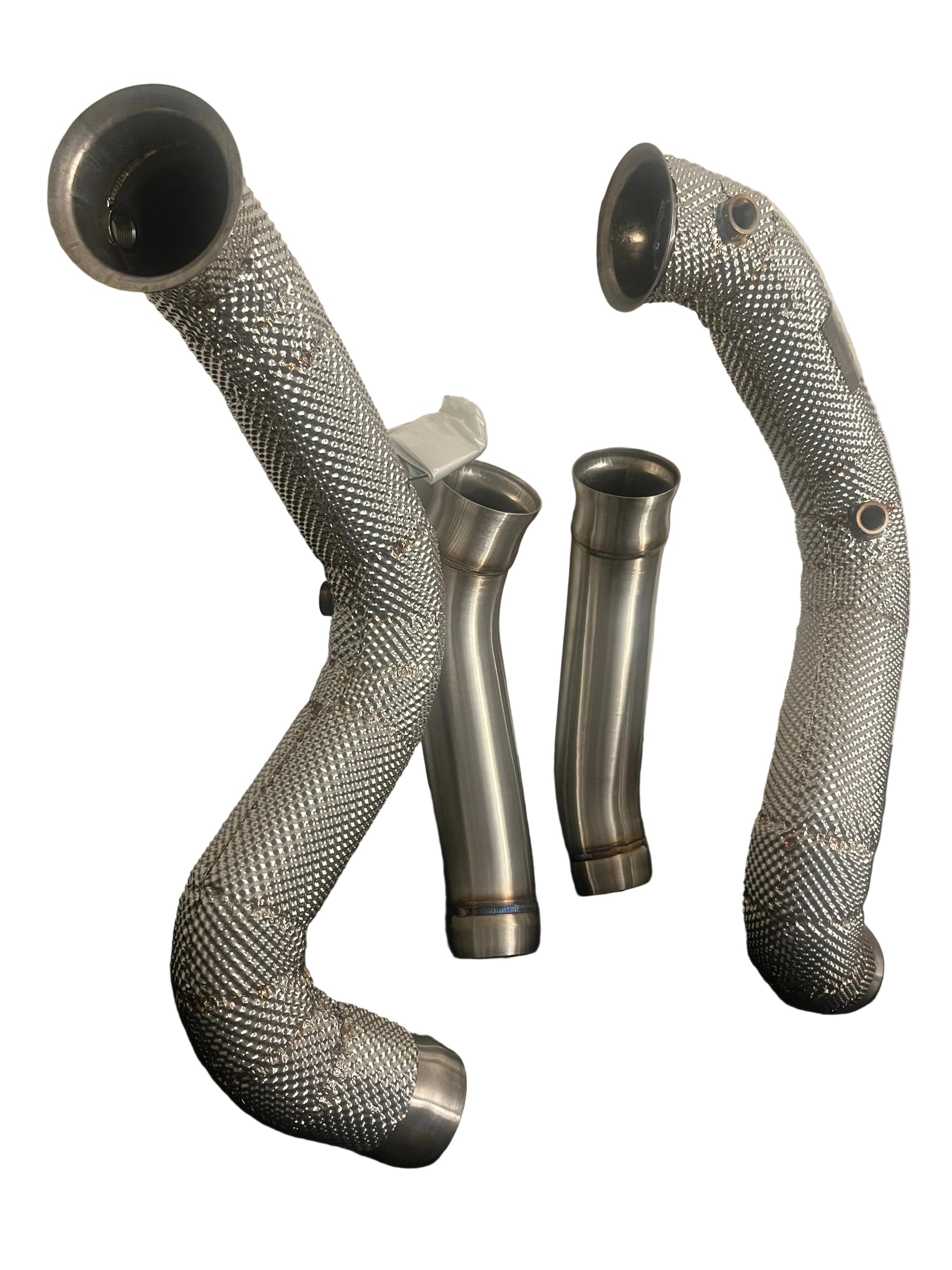 Side profile view of premium heat shielded catless downpipes for W205 C63 AMG