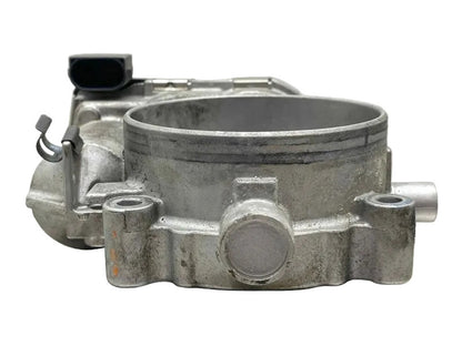 Used genuine Mercedes M273 V8 throttle body actuator in tested condition – top view showing throttle plate (OEM 2731410325)
