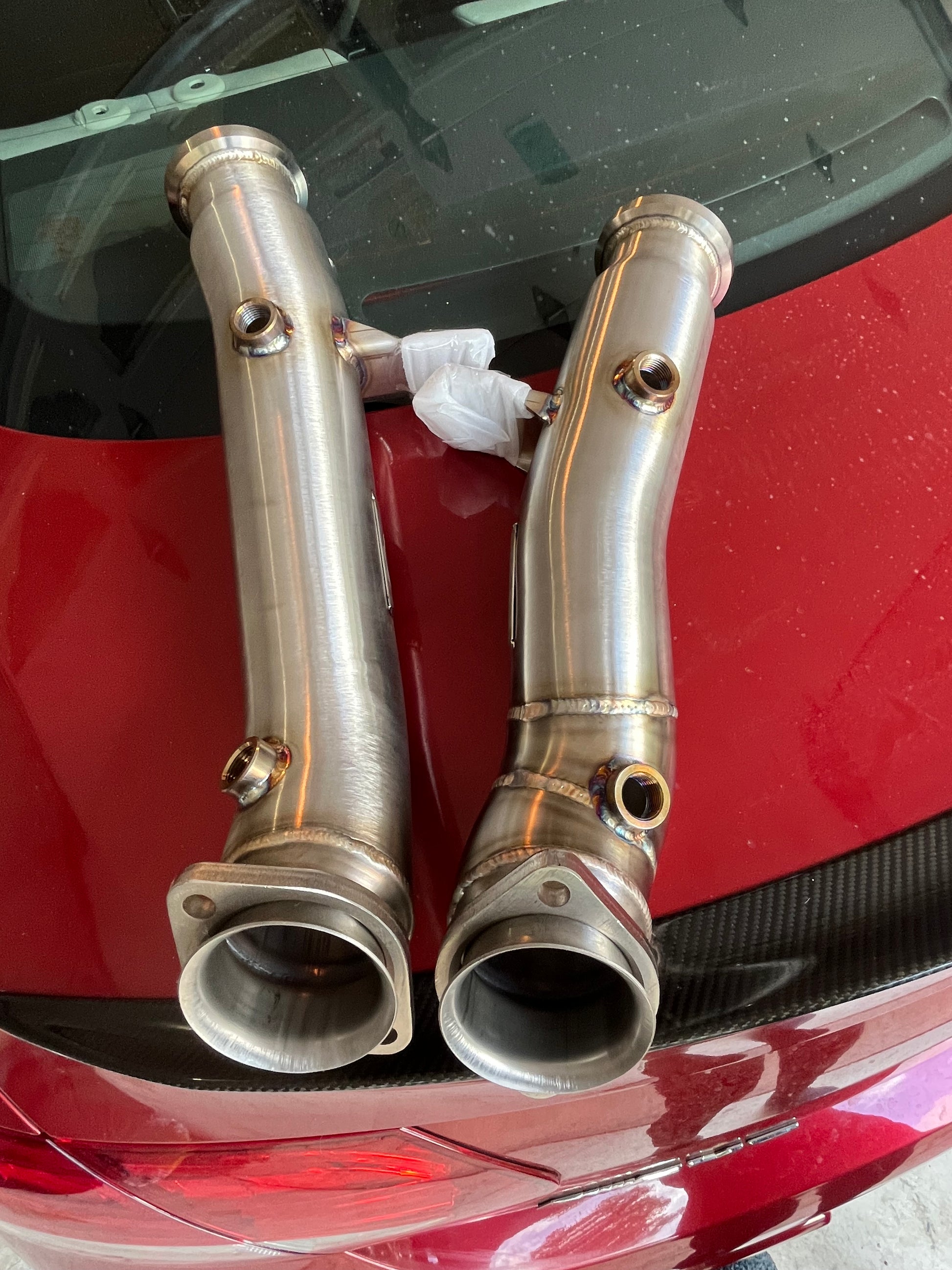 Inlet end view of stainless steel downpipes for Mercedes AMG M276 engine