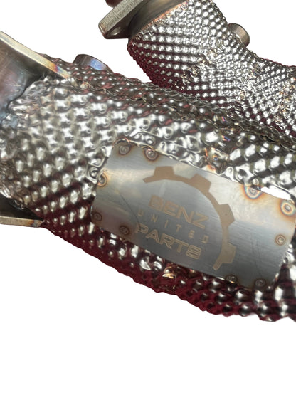 Close-up of TIG welds and integrated heat shielding on Mercedes M276 catless downpipes for E-Class models