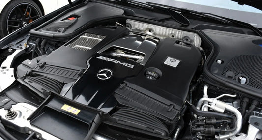 Mercedes-AMG M177 4.0L V8 engine bay showing factory twin-turbo layout, used for custom ECU tuning on W213 E63 and E63S models