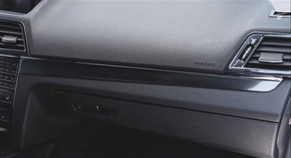 Installed stainless steel carbon fiber style glove box trim in Mercedes E-Class C207 Coupe