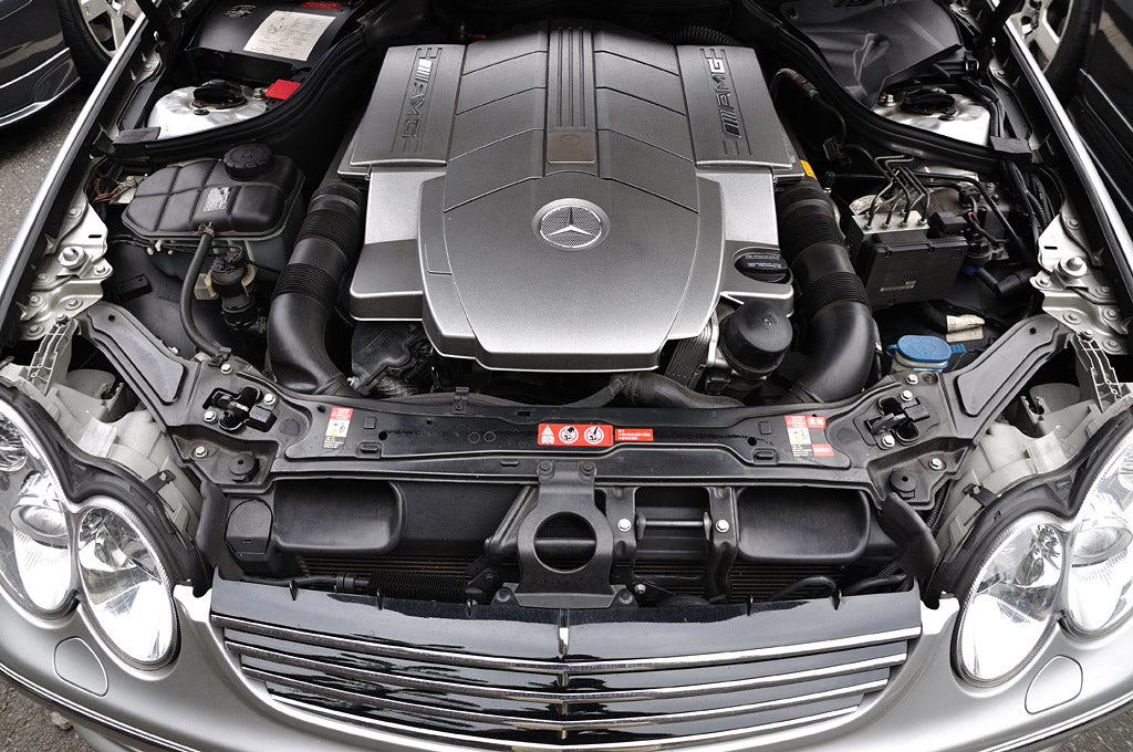 Mercedes-AMG M113 5.4L V8 engine bay – C55 AMG with factory airbox and ECU configuration