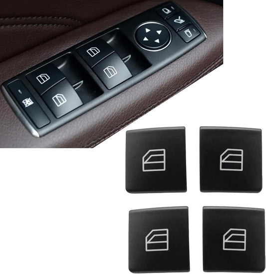 Mercedes driver-side power window switch panel shown above the four black replacement button caps