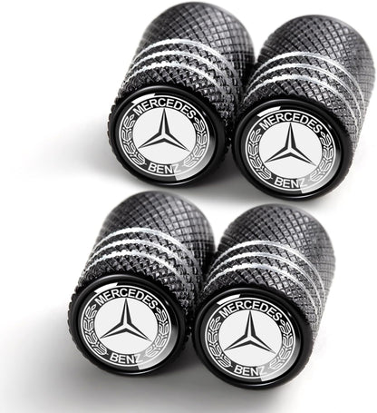 Set of 4 black Mercedes-Benz tire valve stem caps with raised logo, corrosion-resistant with O-ring seal