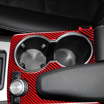 Red carbon fiber cup holder trim installed on Mercedes W204 center console