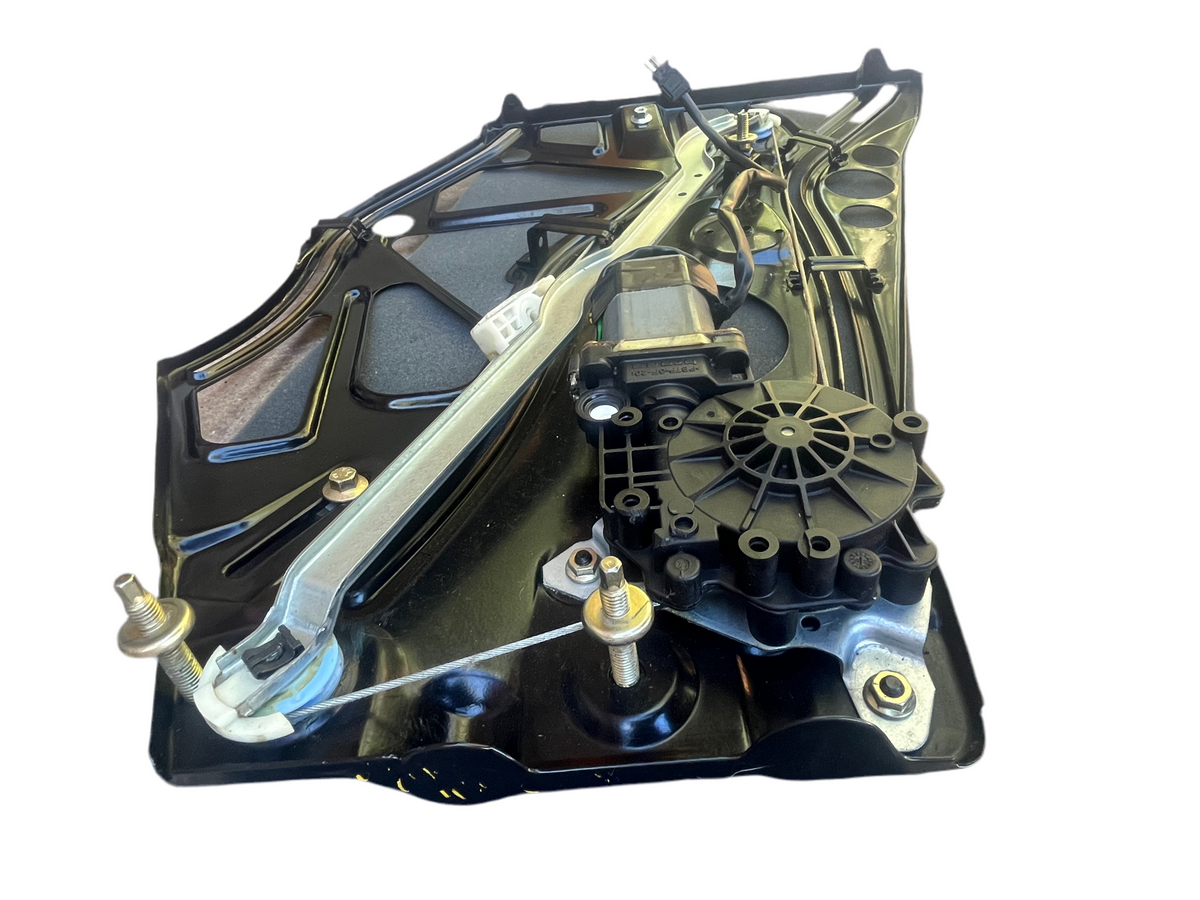 Close-up of the motor, gearbox and guide rail on the A2086700103 W208 CLK Convertible rear left regulator