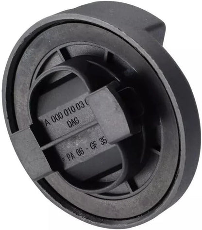 Rear view of oil filler cap showing locking tabs and OEM part markings