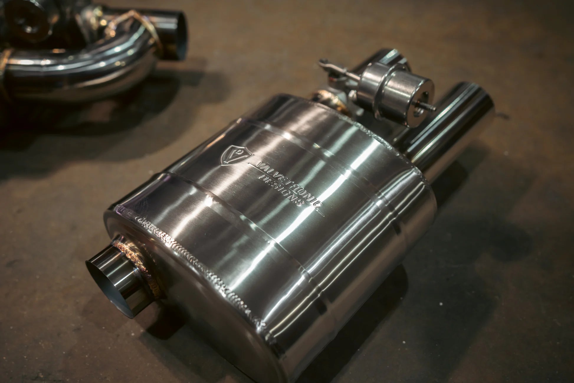 Full kit contents including muffler, wiring, red control box, and key fob for Valvetronic Designs valved exhaust