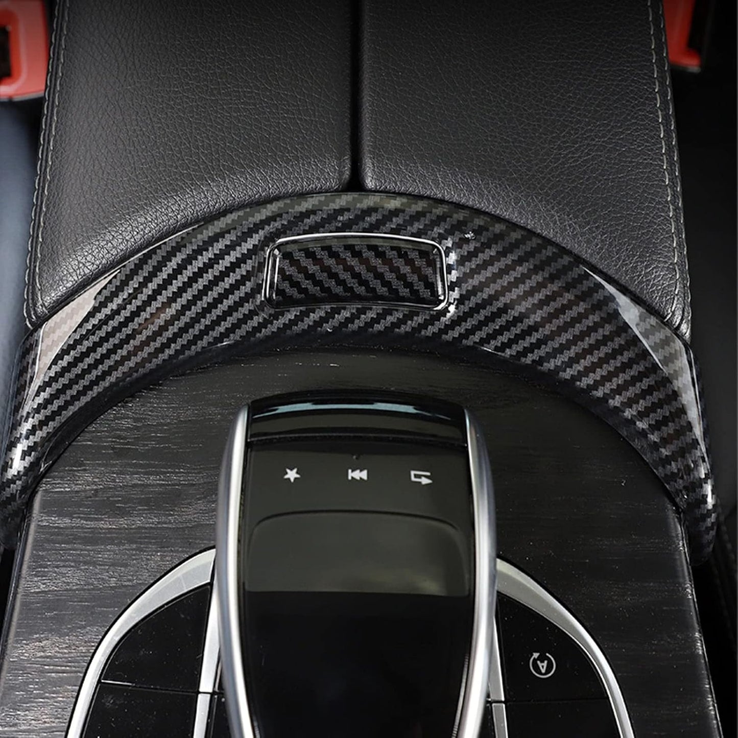 Center console interior view showing armrest release button in Mercedes W205 C43 and C450 AMG
