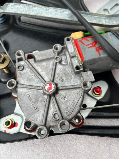 Detailed view of CLK W208 window motor showing Bosch part number