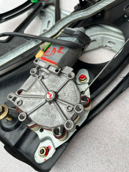 OEM Mercedes window motor close-up for CLK W208, label visible
