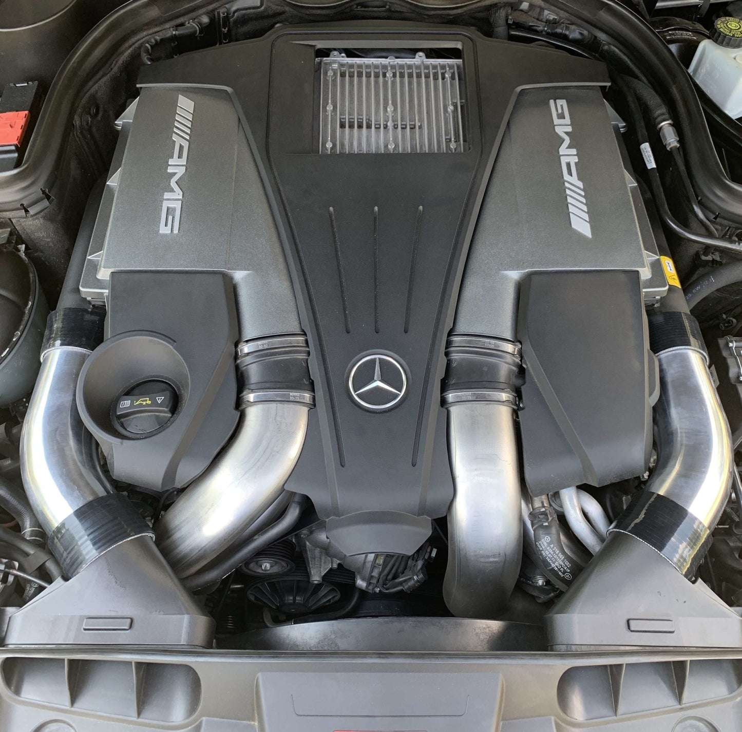 Mercedes-Benz AMG M278 engine with aluminum intake tubes installed – performance airflow upgrade for W212 W218 platforms